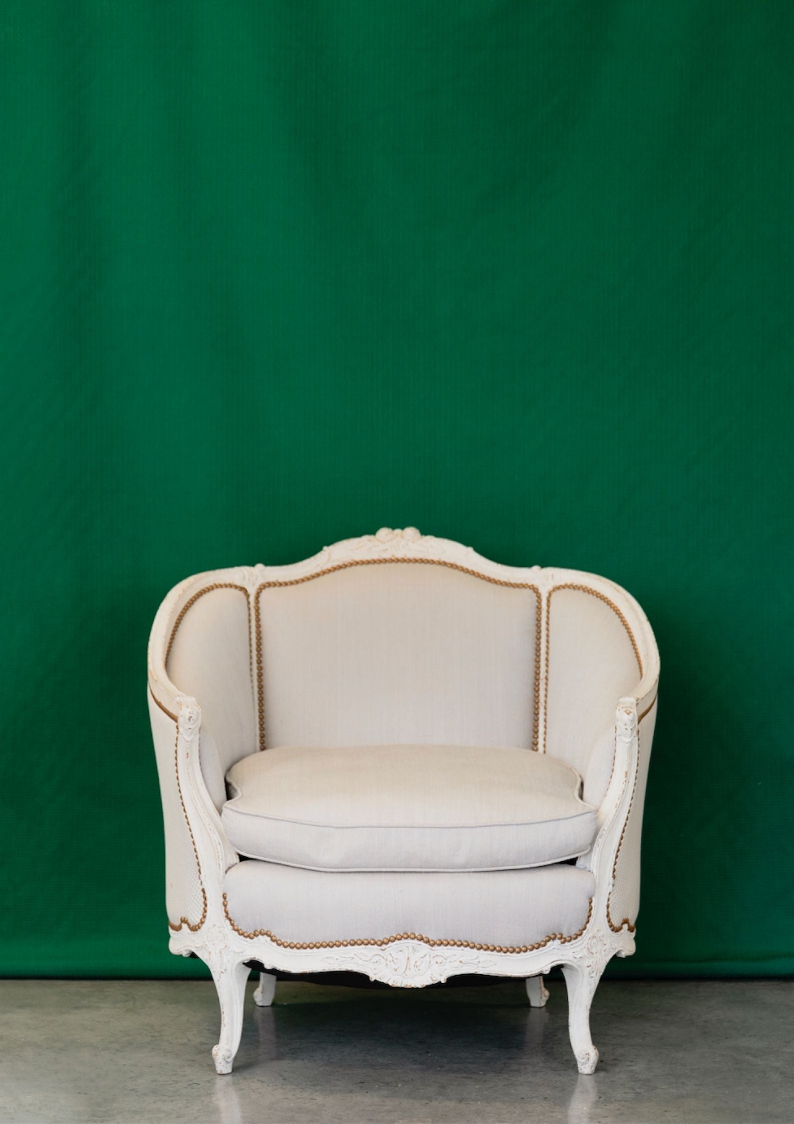 A pair of French Louis XVI Style painted Armchairs