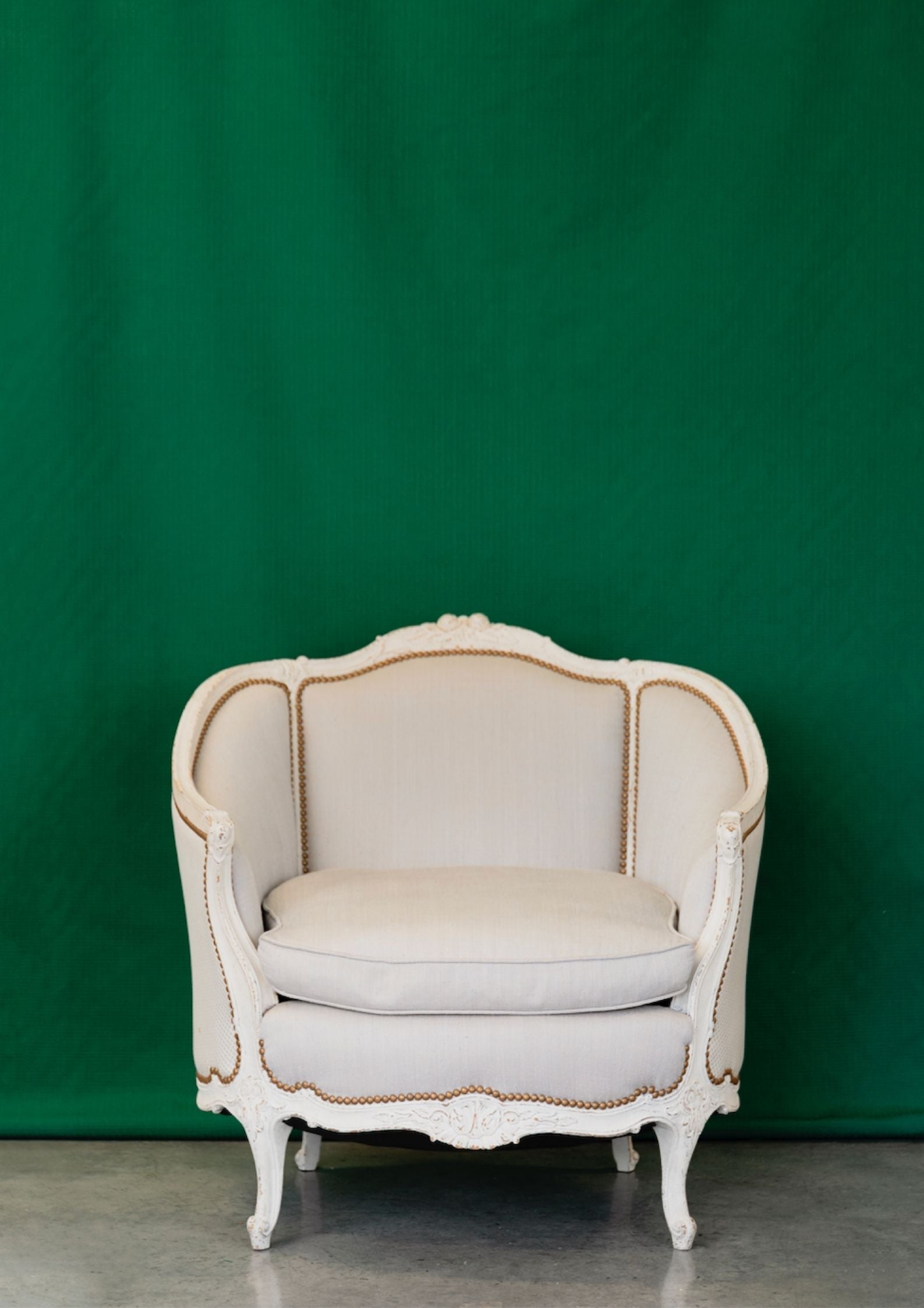 A pair of French Louis XVI Style painted Armchairs