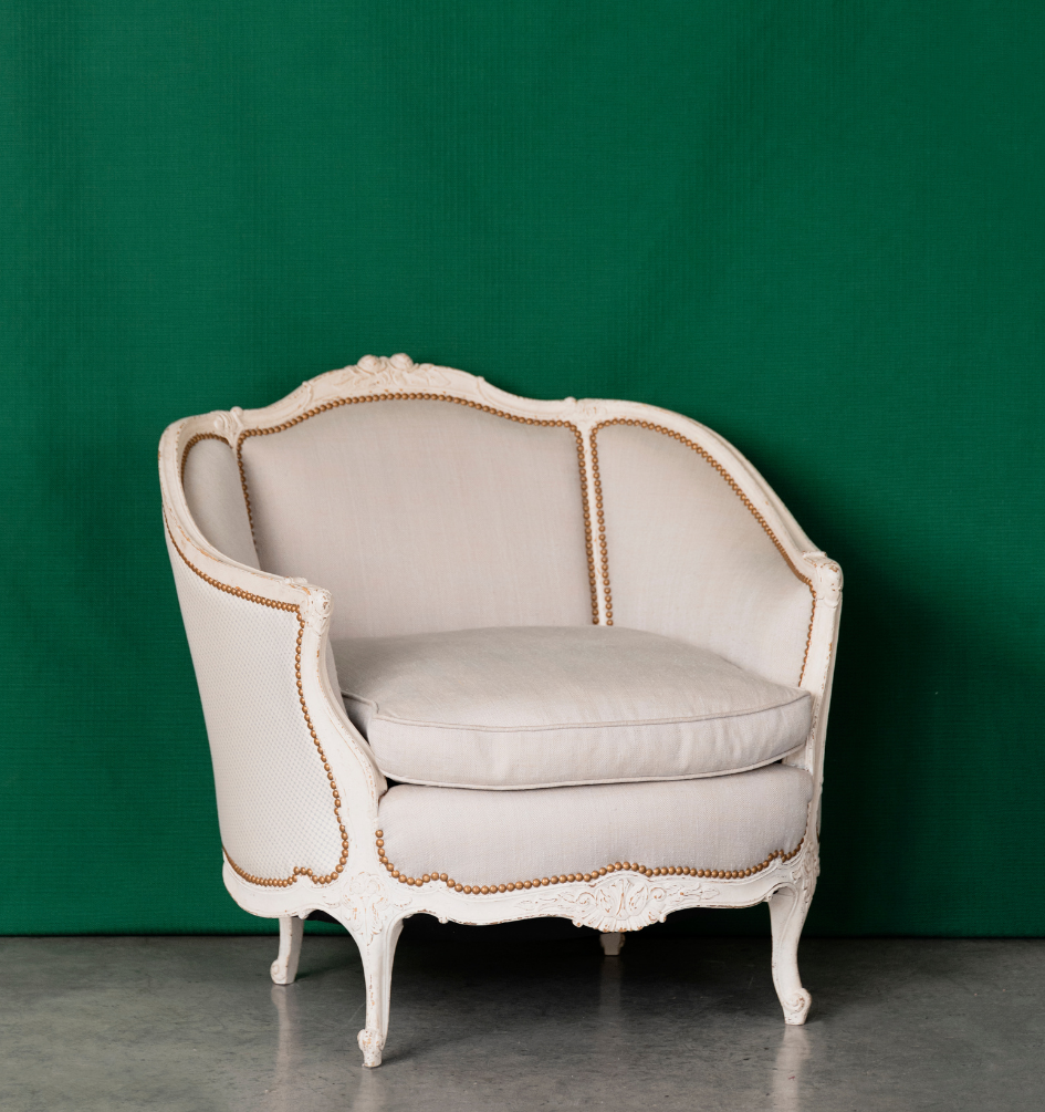 A pair of French Louis XVI Style painted Armchairs