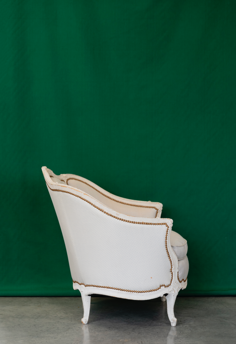 A pair of French Louis XVI Style painted Armchairs